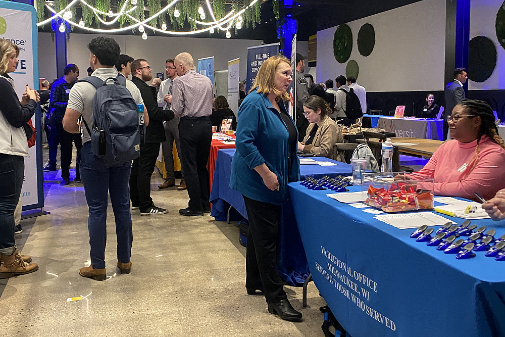 Students interact with employers at the WIPCCC Career Expo.