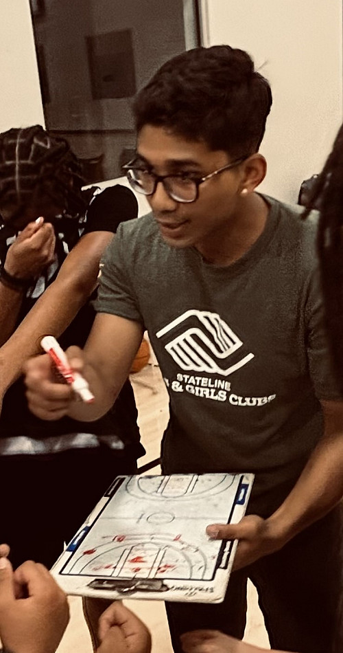 Iftesham Rahman Sami' 25 coaching a team at the Boys & Girls Club