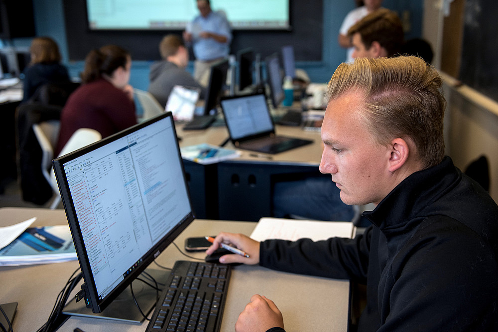 A Beloit College student works with a set of data in a computer lab.