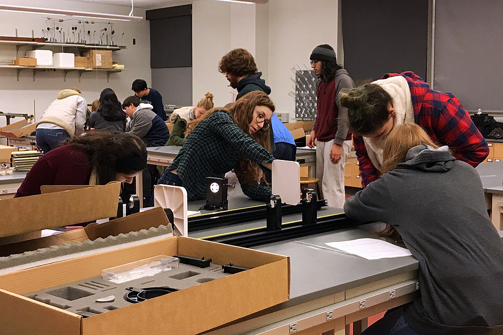 Students in Introductory Astronomy build telescopes in the physics lab.
