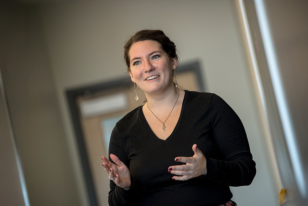 A Beloit College student teaches before a class.