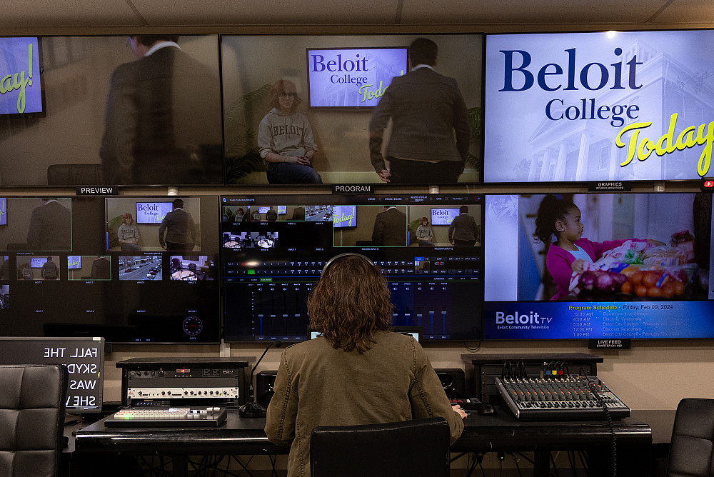 A student working at the large switching station for Beloit Access Television.