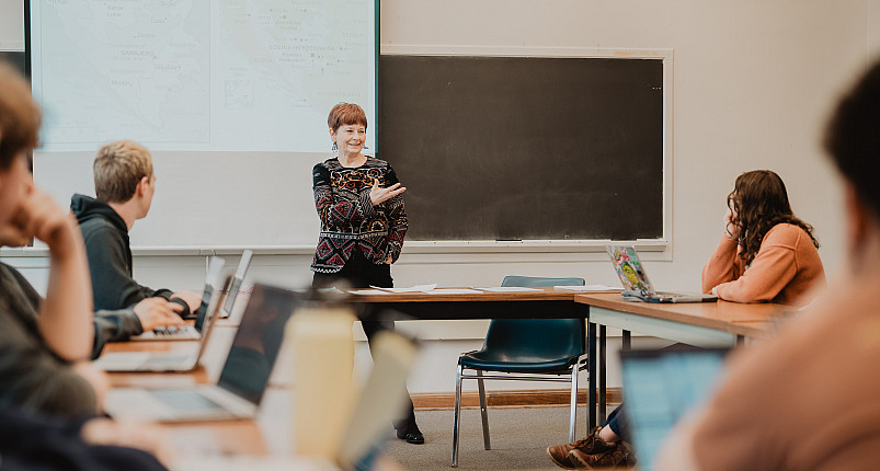 Professor Beth Dougherty leads a course in a classroom of Morse-Ingersoll Hall.