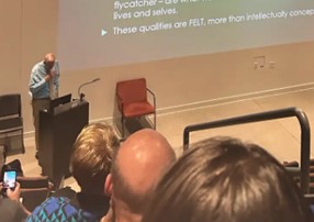 Mark Johnson delivers his lecture on embodied cognition.