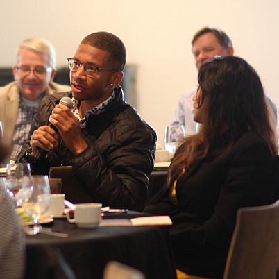    Jalen Ponder '25 asking a question to Oakleigh Ryan at the 2024 Upton Forum lunch exploring the ideas of Upton Scholar David Audretsch 