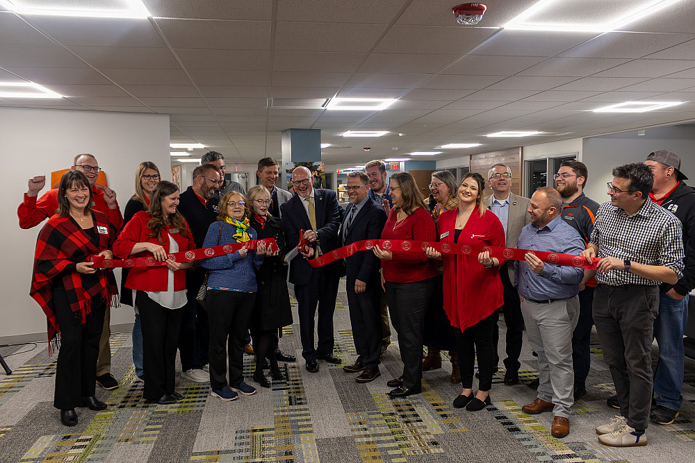 Beloit College staff and guests cut the ribbon