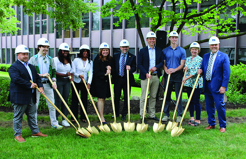 President Eric Boynton and others at the groundbreaking for library renovations.