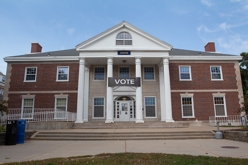 Chapin Hall with a black VOTE banner with white lettering hanging across two of the building's pillars.