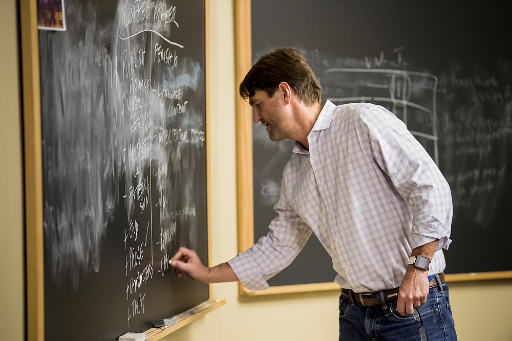 Professor of English Chris Fink, editor of the Beloit Fiction Journal, helps students track the short stories they've selected for the co...