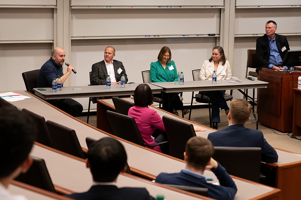 A panel of six accomplished alumni talks to students during the 2024 Business Networking Summit.