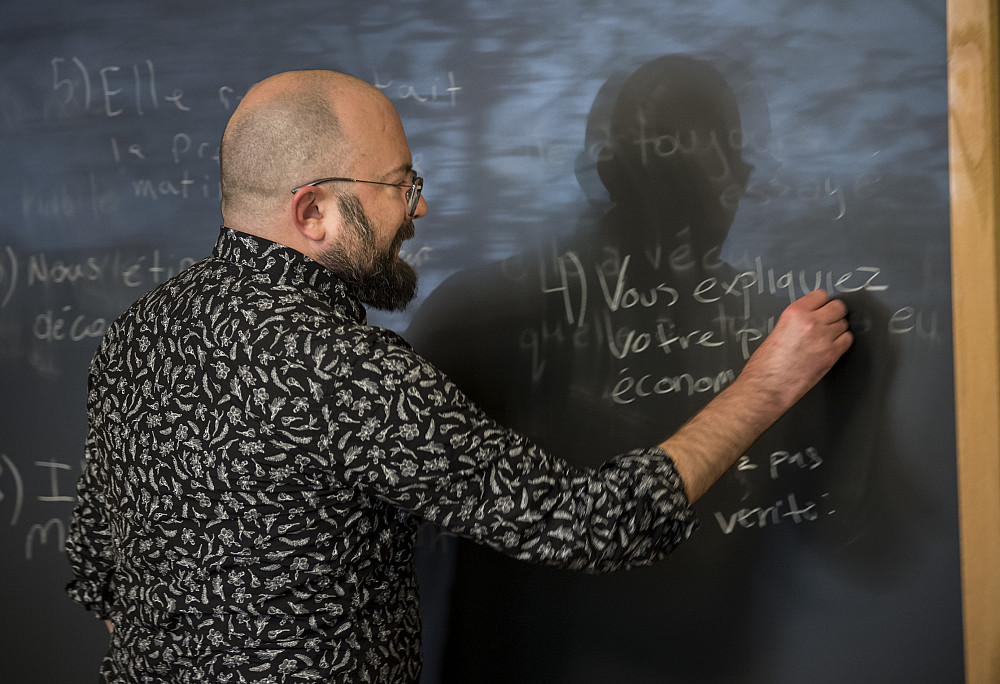 Prof. Joseph Derosier instructing a French class.