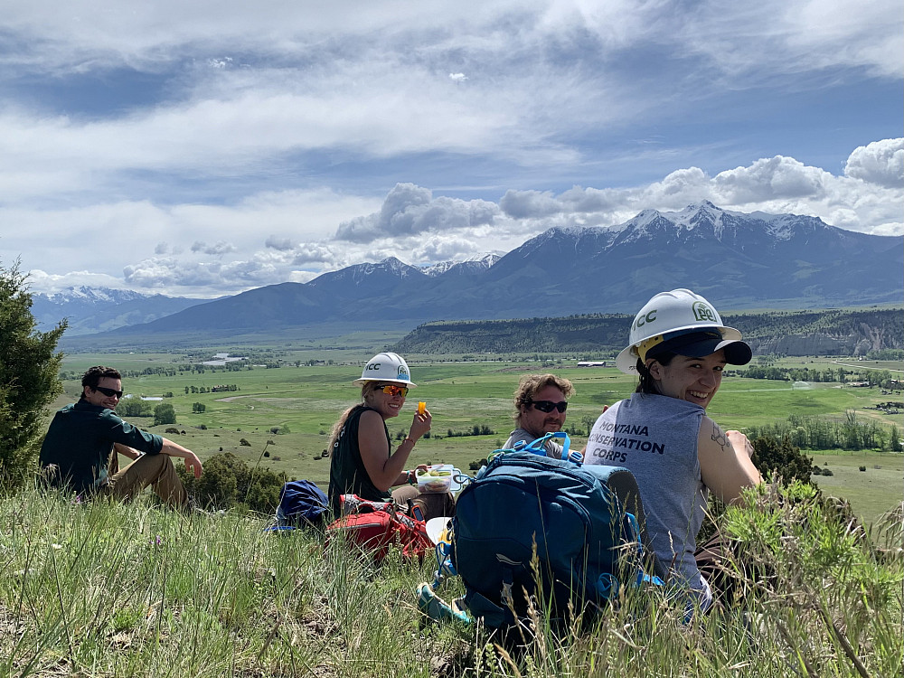 A contingent of the Montana Conservation Corps stops to snag a good view and some food.