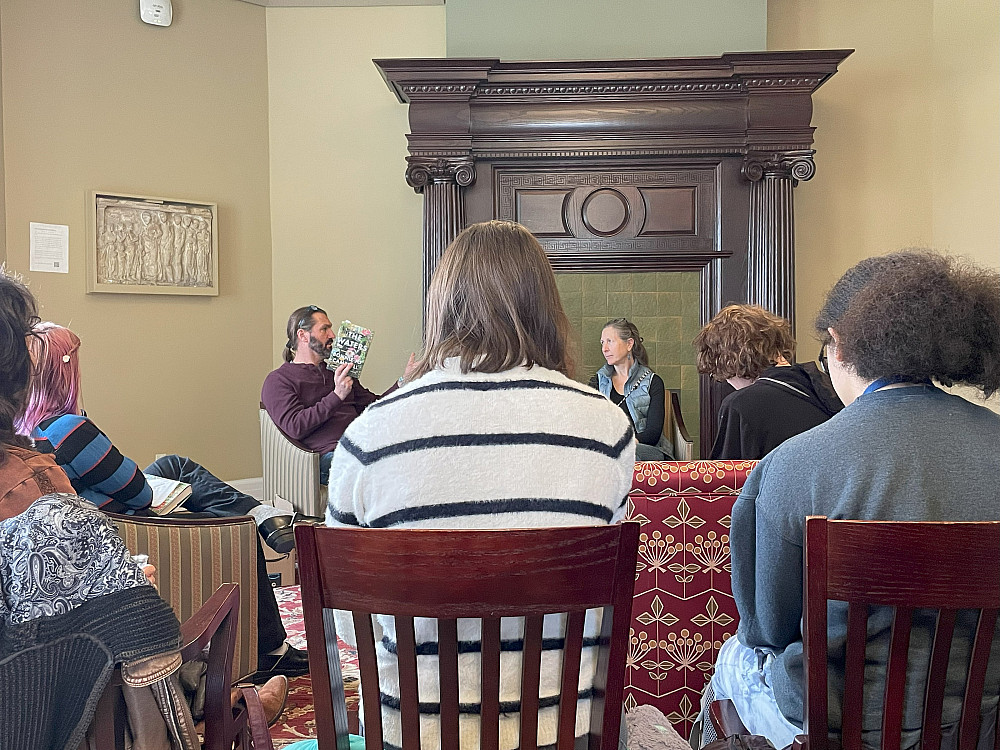 Students attend a reading from 2022 Mackey Chair &lt...