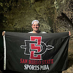 Thomas Kosakowski’23 representing his MBA program on a cave expedition in the Domincan Republic.
