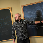 Professor of French Joseph Derosier asks his students to read translations of medieval literature.