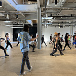 Dance alumni rehearse for a group performance to celebrate the major’s 30th anniversary.