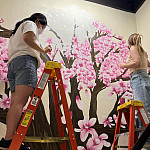 Beloit College artists Brooke McCammond and Hannah Kang spent approximately 14 hours per week on the mural at Beloit Memorial Hospital.