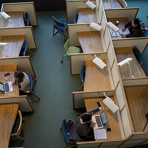 Students hard at work in the cubbies of Morse Library.