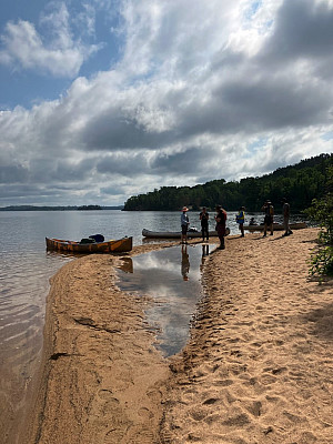 Exploring a Basswood Lake beach to camp across from Canada. 
