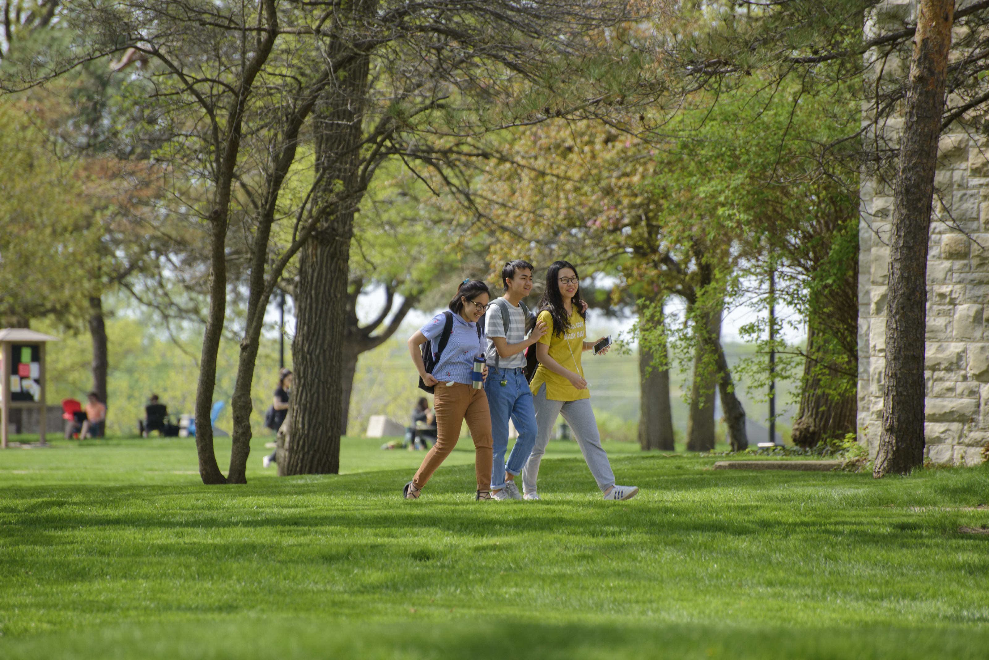 Beloit students stroll across the park-like campus at Beloit College.