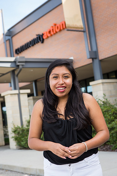 A Beloit College student does an internship in the city of Beloit at the Community Action Center.