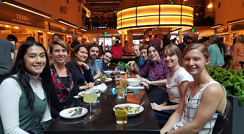 Marlena Fraune'13 with students and HRI researchers in Colorado