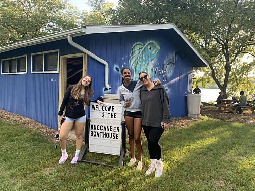 Gisela, right, with friends at the Buccaneer Boathouse during RA and OL orientation, summer 2023.