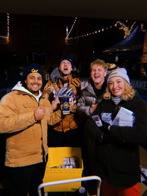 4 happy students hold prizes for Last Call
