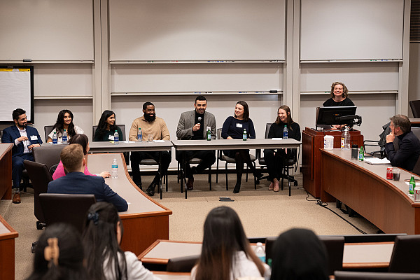 A panel of six recent graduates talks to students during the 2024 Business Networking Summit.