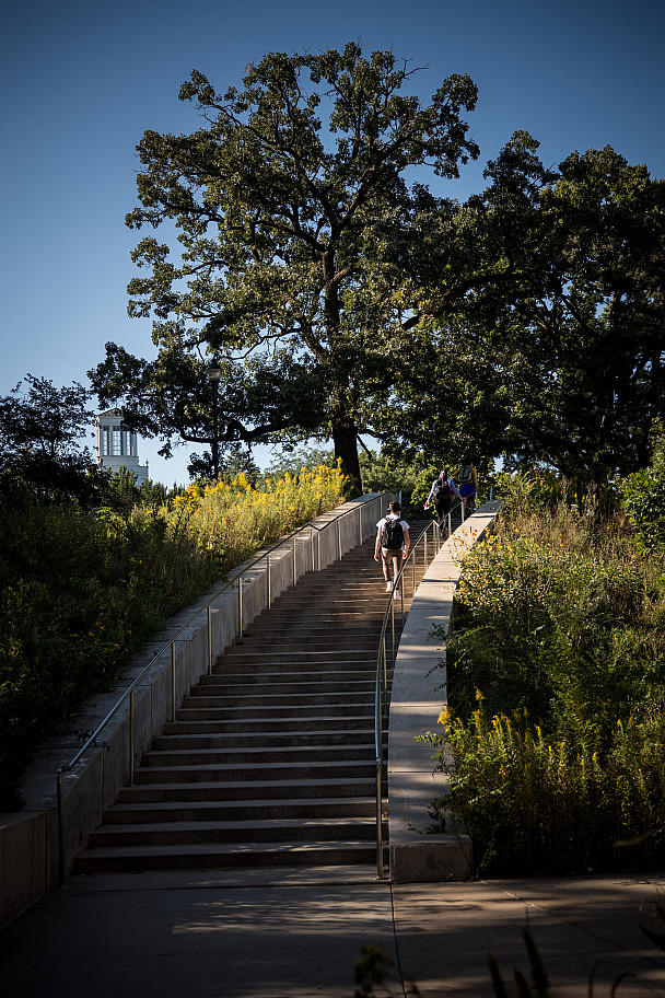 Beloit College students climb the curving stairway near the Sanger Center for the Sciences.