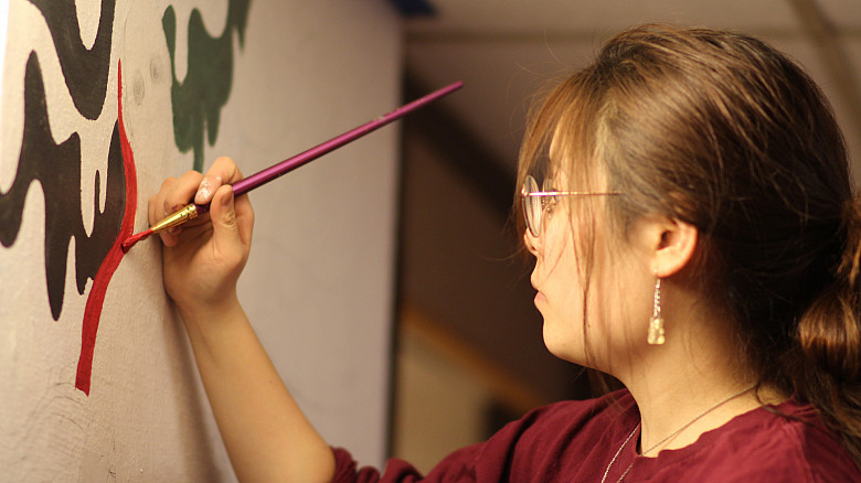 Hannah Kang'22 is one of four student artists commissioned to paint murals in common areas of Peet Hall. The project, created and managed...