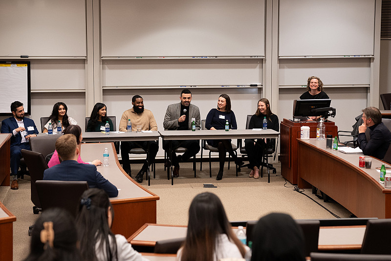 A panel of six recent graduates talks to students during the 2024 Business Networking Summit.