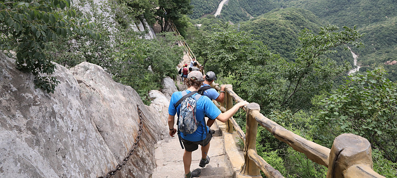 Beloit professors and students climb down a steep trail along the Yellow River in China.