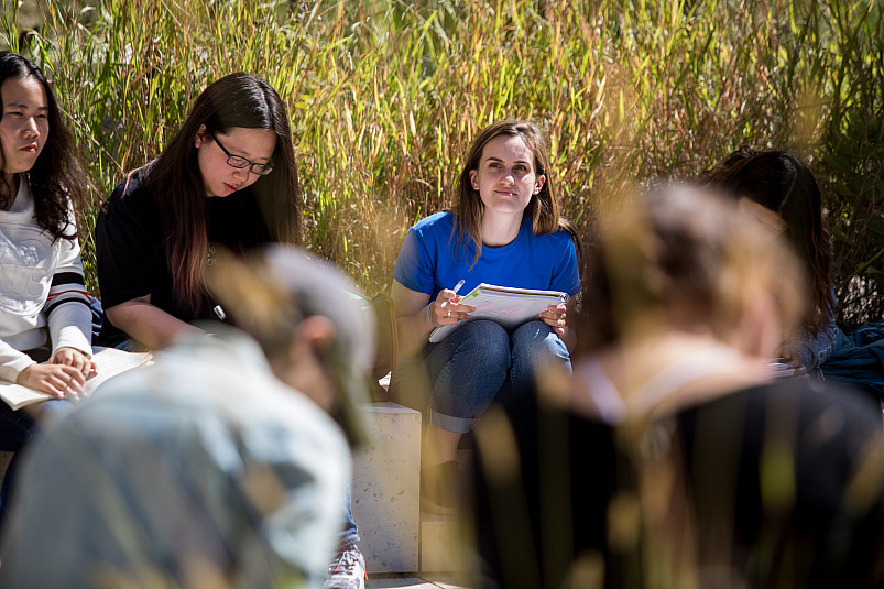 In spring and fall students attend a class outdoors in the garden near the Sanger Center for the ...