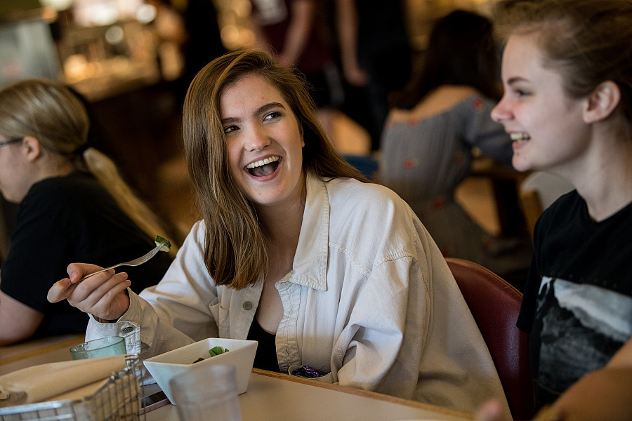 Students enjoying a meal in the Commons dining hall.