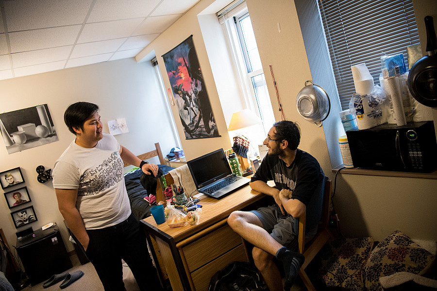 Beloit students in a dorm room on the Beloit College campus.