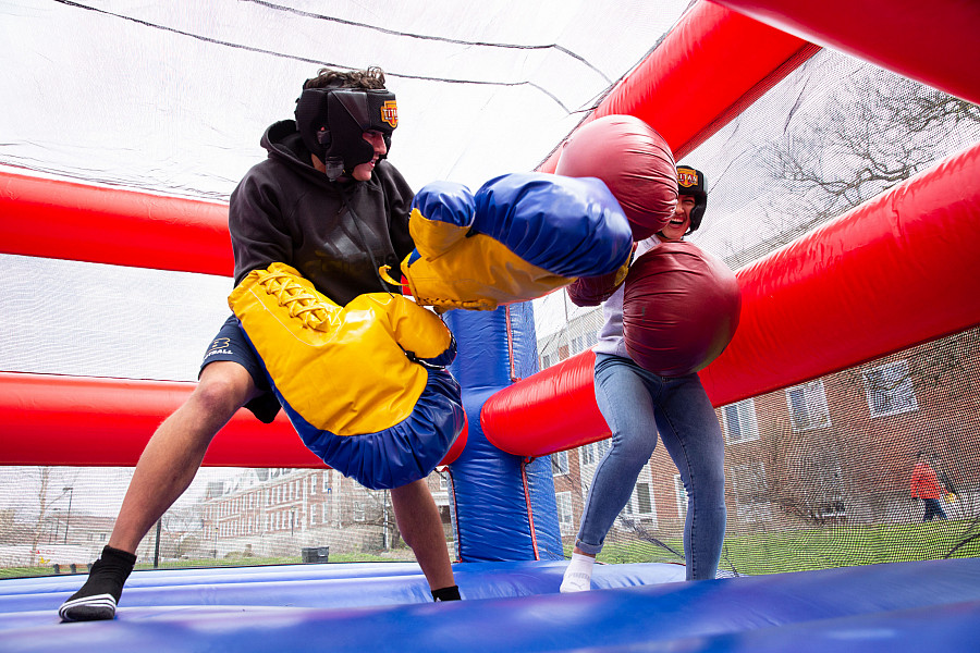 Beloiters put on super-sized boxing gloves to playfully outpunch their competitors.