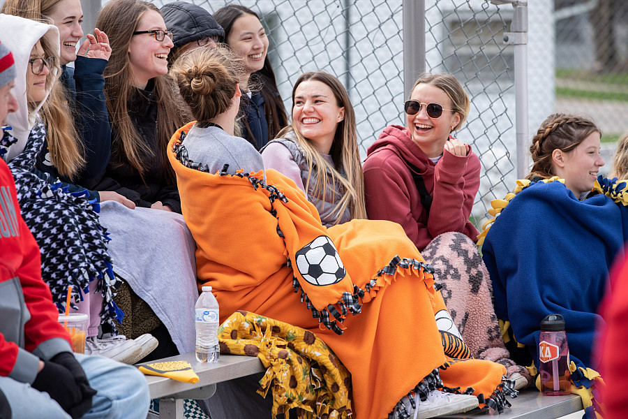 Beloit Buccaneers fans brave cool temps to cheer on their team at an April baseball game.