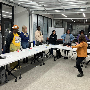 Emily Eagle’06 holds a workshop with students to learn facilitation skills.