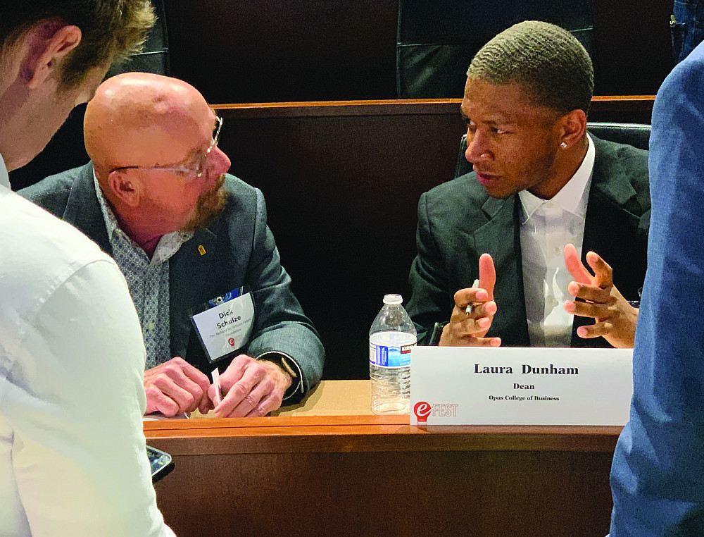 Jalen Ponder'24 shares ideas with e-Fest patron and Best Buy founder, Dick Schulze.