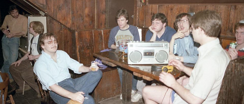Students unwind in the C-Haus basement, year unknown.