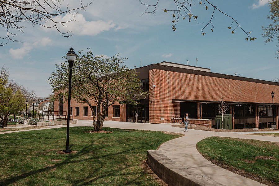 Grass and sidewalk leading to the northwest corner of the library