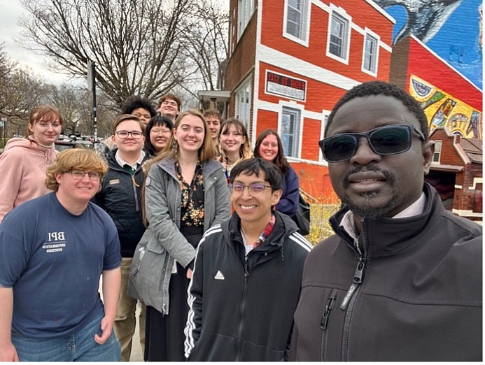 Dr. Gana Ndiaye and Logan Museum Assistant Curator Leeann Ream with ANTH 275 Global Cities students.