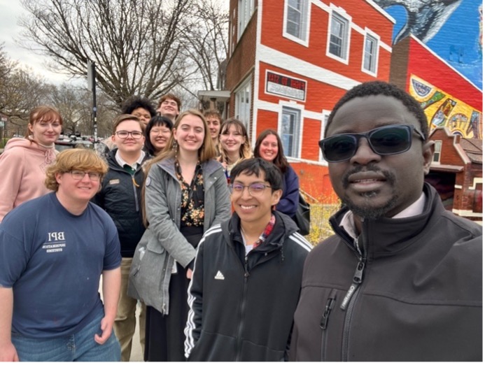 Dr. Gana Ndiaye and Logan Museum Assistant Curator Leeann Ream touring the Pilsen Neighborhood with students from ANTH 275 Global Cities.