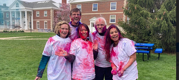 Econ/business Faculty at Holi Festival on campus in April 2022