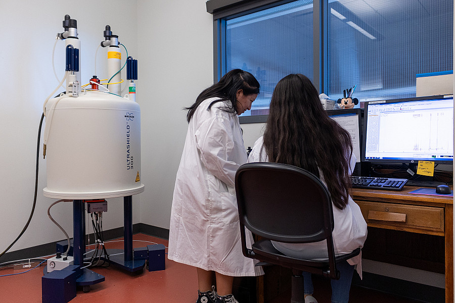 Students using a NMR spectrometer.