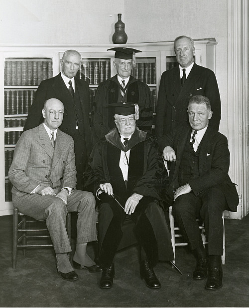 Top row, left to right: Henry W. Austin (trustee), Professor George L. Collie (class of 1881), President Irving Maurer (class of 1904). B...