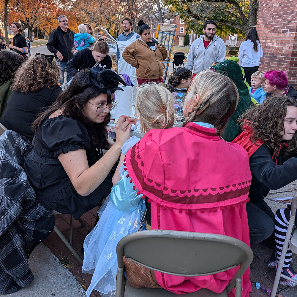 halloween face painting Anna and Elsa get their face painted by the Wall.