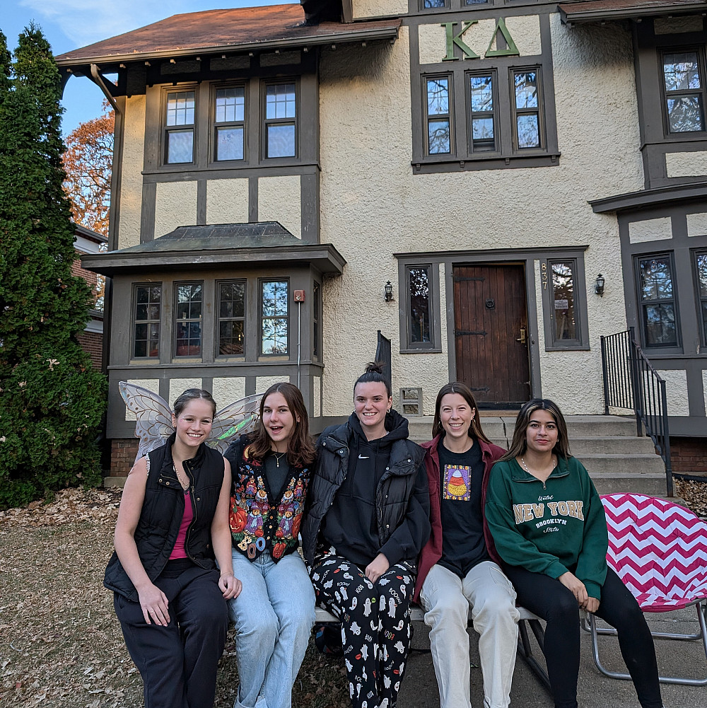 halloween at kappa delta Kappa Delta sorority members welcome trick or treaters to their house.