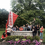 Charlie Holguin and his TKE brothers raise the fraternity's flag at the main Beloit College sign at Chapin and College Streets. -- Submit...